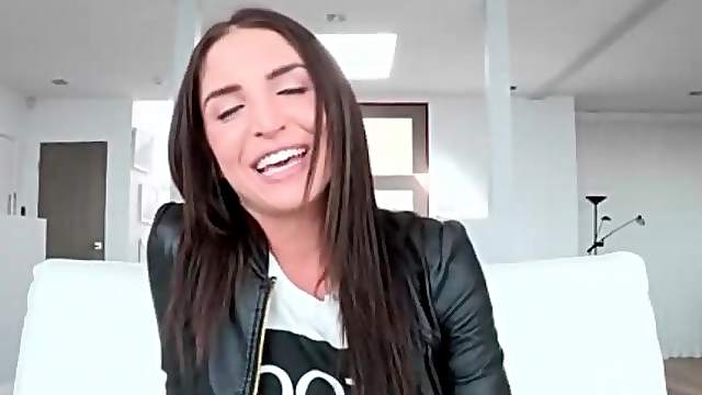 Beautiful young brunette in leather jacket