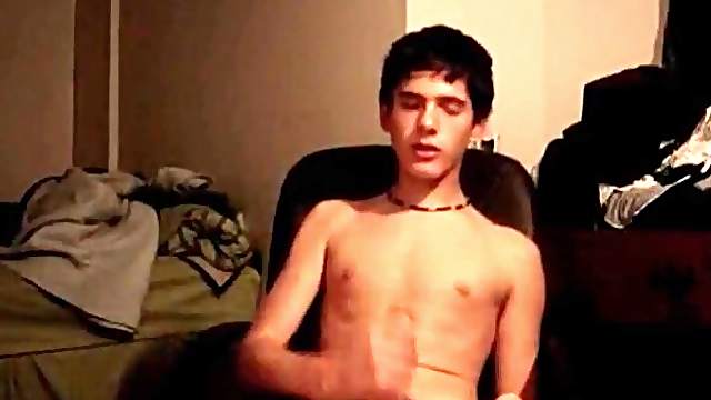 Twink cutie strokes his cock in office chair