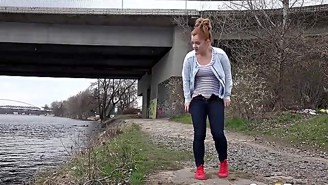 Redhead by the river takes a hot piss