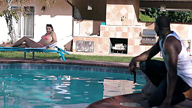 Black hunk shows this curious chick insane interracial sex by the pool