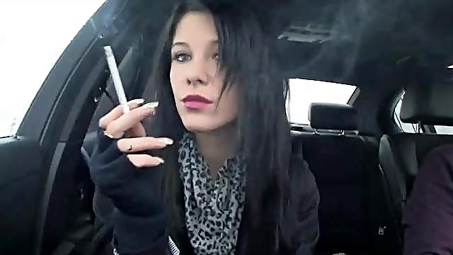 Adrianne Black smokes cigarette in car