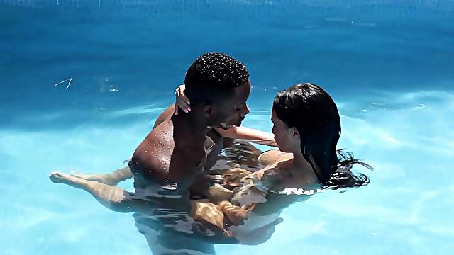 Black hunk fucks teen doll by the pool and cums on her tits