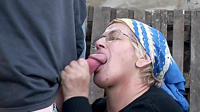 A mature woman moans as she gets fucked doggy style in the village