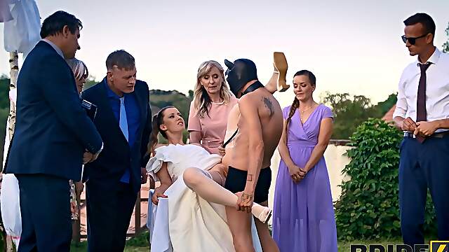Andrea and her masked groom fucked outdoors on their wedding day