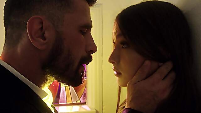 Brunette Izzy Lush in stockings and lingerie, enjoying intimate moments with her partner.