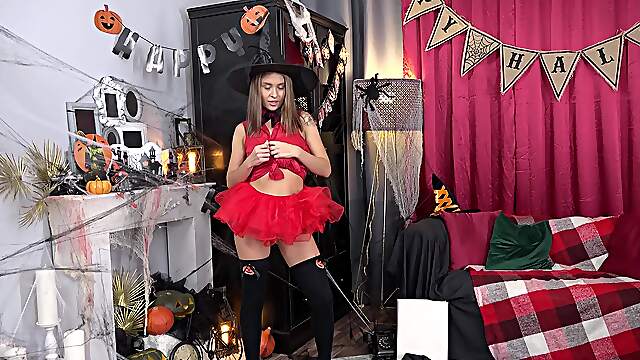 Halloween hottie Skye Wood bends over in a miniskirt and tiny corset