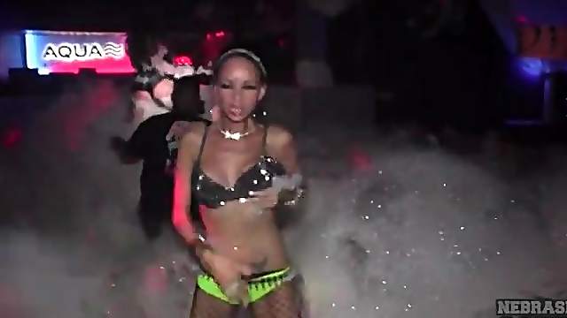 Hot chicks dancing at a foam party