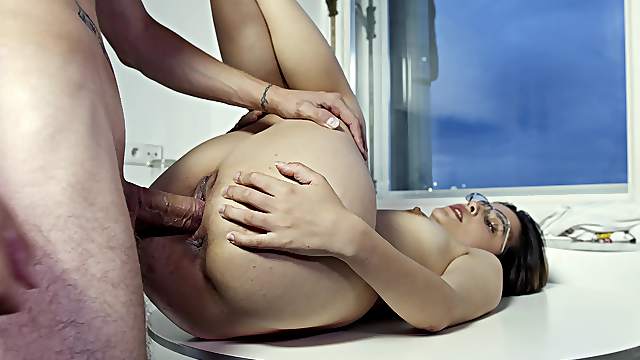 Nerdy young babe tries the kitchen for a few rounds of heavy sex